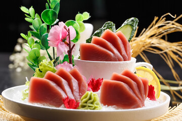 Ultra-low temperature tuna sashimi is placed on a straw mat