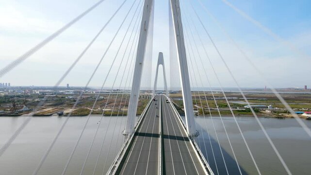 Crossing Liaohe Bridge in Yingkou City offers stunning views of notable landmarks and riverside landscapes