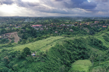 Panoramic View of Lush Balinese Hills and Canyons Under Dramatic Clouds