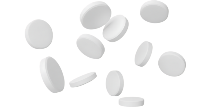 White round pills falling against a black background illustrating medicine and healthcare