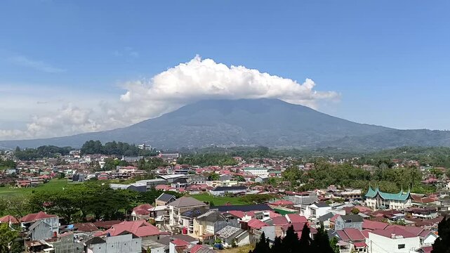 city ​​view with Mount Singgalang in the background