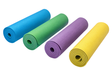 Four colorful rolled up yoga mats in blue green purple and yellow isolated on transparent background