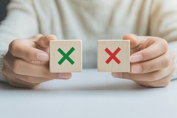 Two wooden blocks, one with a green checkmark, the other with a red X, held by hands