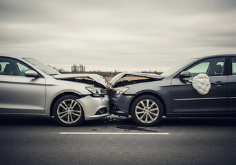 Cracked Headlight in Car Accident and Crumpled Bumper for Insurance Claim
