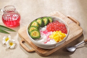 Es Pisang Ijo. Green banana ice is a type of typical food from the Makassar tribe in South Sulawesi. This food is made from bananas coated with green flour dough