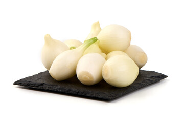Spring Onions pile, slate background, isolated on white background
