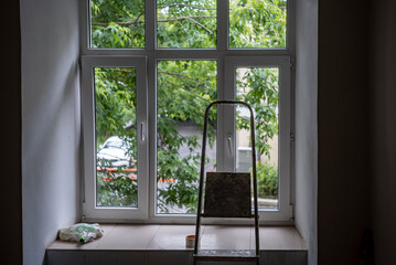 ladder leaned against the window