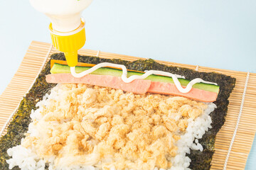 Close up of the process of making delicious sushi