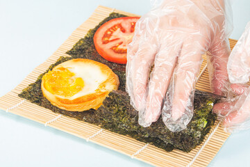 Close up of the process of making delicious sushi