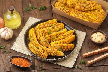 Corn ribs are processed grilled corn that is shaped like ribs.