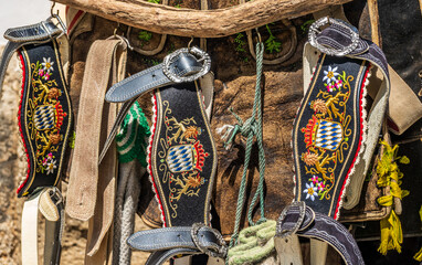 typical bavarian suspenders with the bavarian coat of arms