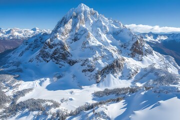 Obraz premium Majestic Snow-Covered Mountain Peak in Winter Landscape for Nature Photography