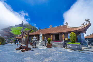 Buddhist temple on top of a foggy mountain. Fansipan mountain Sapa, Lau Cai, Vietnam