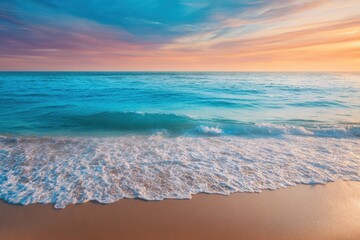 Fototapeta premium Gentle Turquoise Waves Wash Ashore on Sandy Beach Under a Colorful Sunset Sky