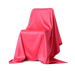 Red velvet curtain covering chair on white background