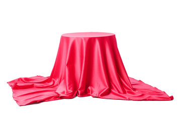 Red velvet curtain covering table on white background