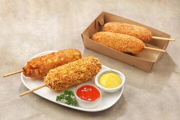 Corn dogs or corndog are a typical South Korean snack that combines sausages with thick flour dough