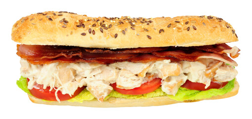 Chicken mayonnaise and bacon sandwich with fresh salad in a crusty multi seed topped baguette bread roll isolated on a white background