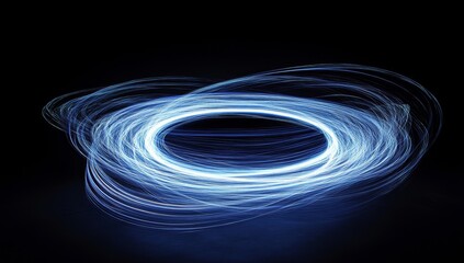 Light trails form an oval shape on a dark background