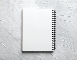 White Spiral-Bound Notebook Mockup on Textured Background