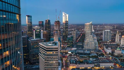 Panoramic city skyline at twilight, showcasing modern skyscrapers and construction. Glass building - Powered by Adobe