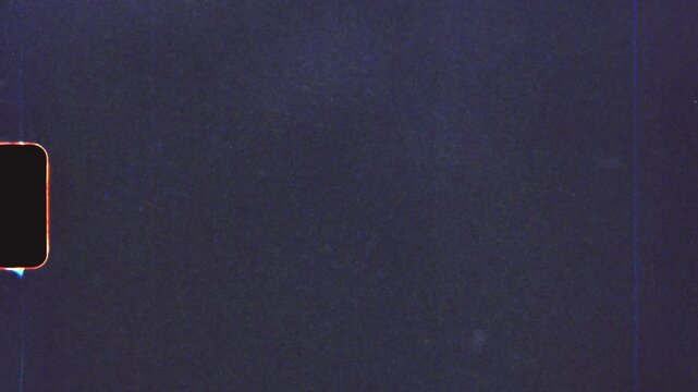 Empty super 8 film frames showing dust and scratches