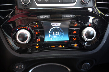 Fototapeta premium Car air conditioning on maximum cold setting. Car air conditioning. The air flow inside the car. Detail interior of vehicle. Air conditioning of a modern car. Vehicle Conditioner Power Regulator