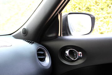 Car air conditioner ventilation grille. Automotive climate control. Airflow inside the car. Interior element of a modern car. Interior detail. Air ducts.