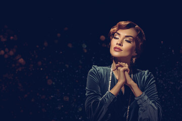 Young beautiful woman posing in luxury earrings and necklace. Dreamy woman with red lips, vintage...