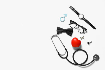 Male sign with heart, stethoscope and male accessories on white background. Prostate cancer...
