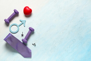 Male sign with heart, tie and dumbbells on light blue background. Prostate cancer awareness concept