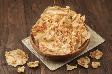 Peyek or Rempeyek shrimp rebon is a traditional snack that uses small shrimp as the main ingredient, giving it a unique taste