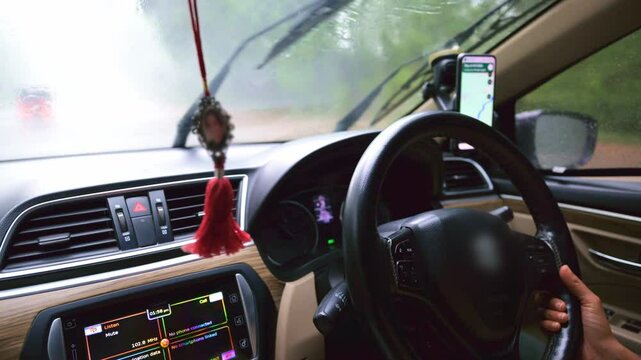 Car Driving in Rainy Weather with Navigation