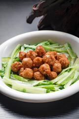 Croquettes on white porcelain plate