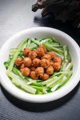 Croquettes on white porcelain plate
