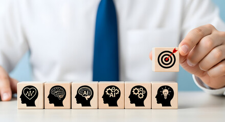 Businessman in a suit placing a target block on top of other blocks with mind, heart, and gear icons, symbolizing goal setting and mental focus in decision making.