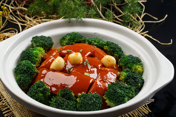 Garlic braised pork in white casserole