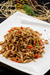 Stir-fried bacon cubes with rice pepper and gourd strips
