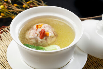 Fresh chicken soup with sunflower and crab meat