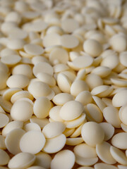 White chocolate chips Pistols buttons. Confection and pastry concept.