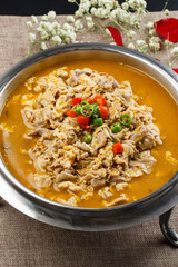 Sour lamb soup in stainless steel cutlery