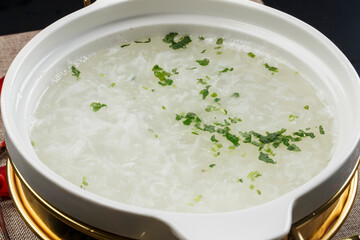 West Lake beef soup in a white porcelain bowl