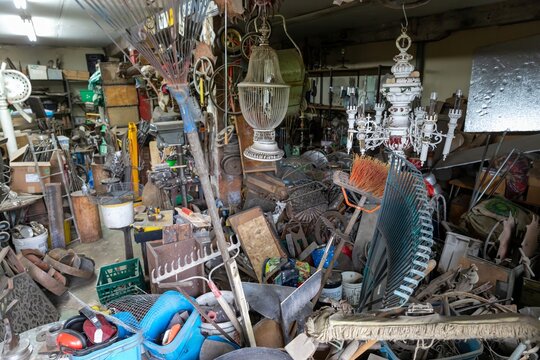 A cluttered workshop in Montreal, Quebec, Canada, filled with tools, equipment, and various objects. A creative space, showcasing the tools and materials used for artistic endeavors.