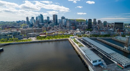 Aerial view of Montreal's skyline and port in Canada. The photo showcases the city's architecture...