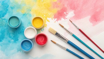 Art supplies including paint pots and brushes arranged on a colorful watercolor background