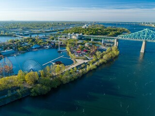 Aerial view of La Ronde amusement park, with Jacques-Cartier Bridge in Montreal, Quebec, Canada....