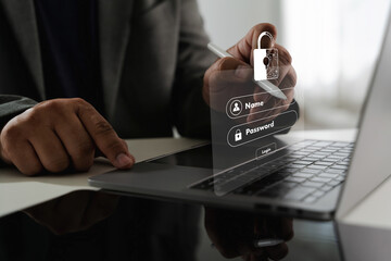 Cybersecurity Data privacy image shows person using laptop with digital overlay of login form and padlock icon, symbolizing cybersecurity