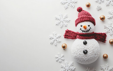 Here's a festive holiday image featuring a cute snowman in a hat and scarf next to a snow-covered Christmas tree, symbolizing the joyful winter season