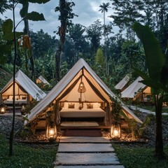Serene glamping tents nestled in a lush rainforest.  Peaceful, rustic, and stylish accommodation amidst nature