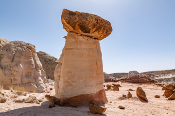 Entrada Sandstone（Middle Jurassic）with Dakota Formation. Toadstool Hoodoos Trail, Kane County, Utah geology.  tent rock, fairy chimney, or earth pyramid. Weathering, erosion.